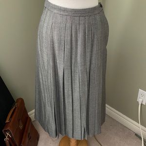 Wool pleated skirt, made in Scotland.